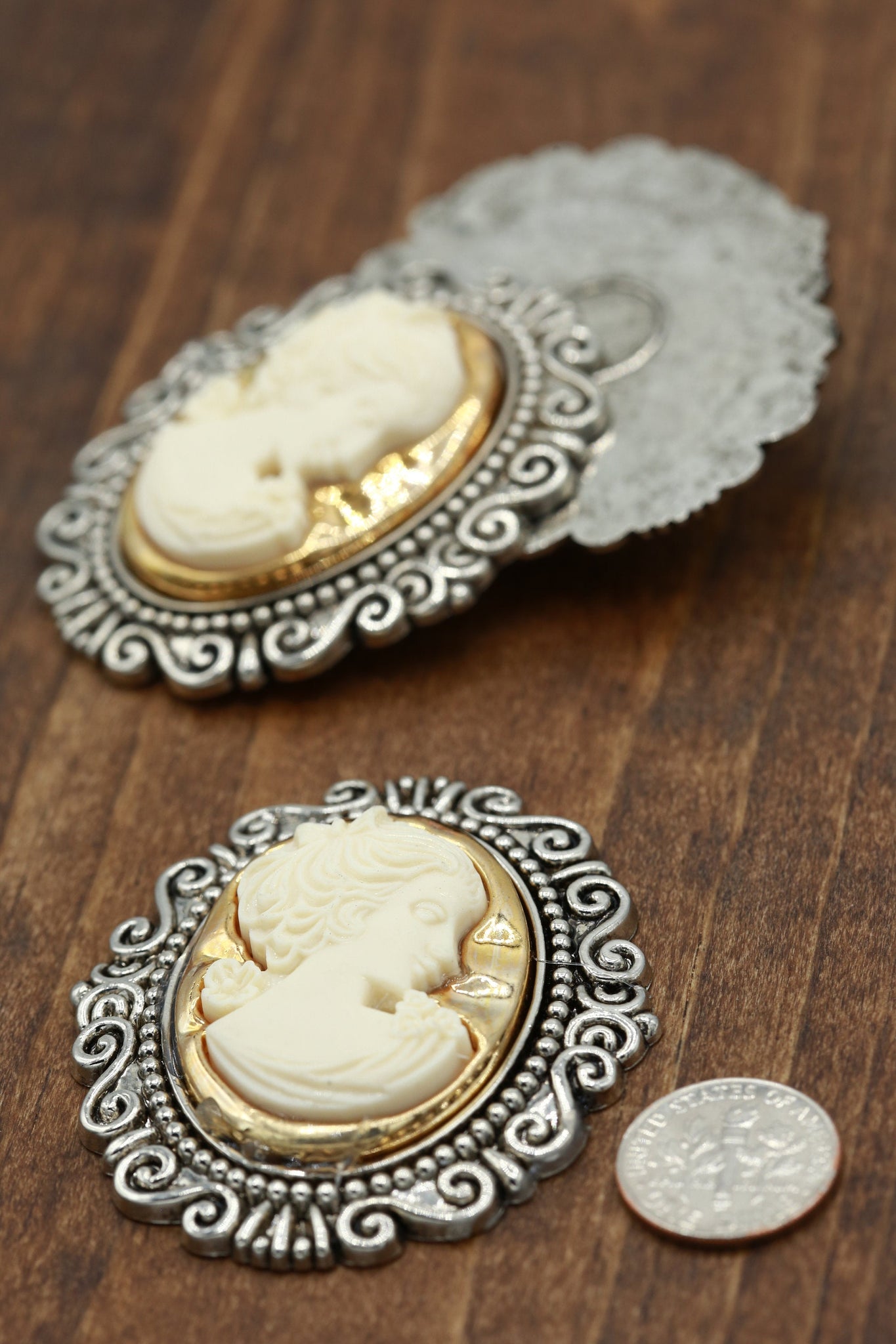 1 Ivory Face Gold Background Silver Frame Cameo Button