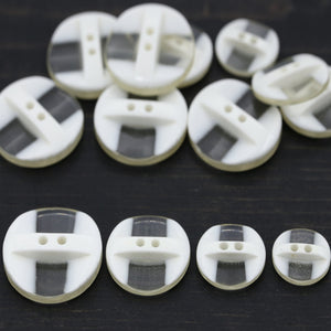 4 Clear and Ivory Plastic Button