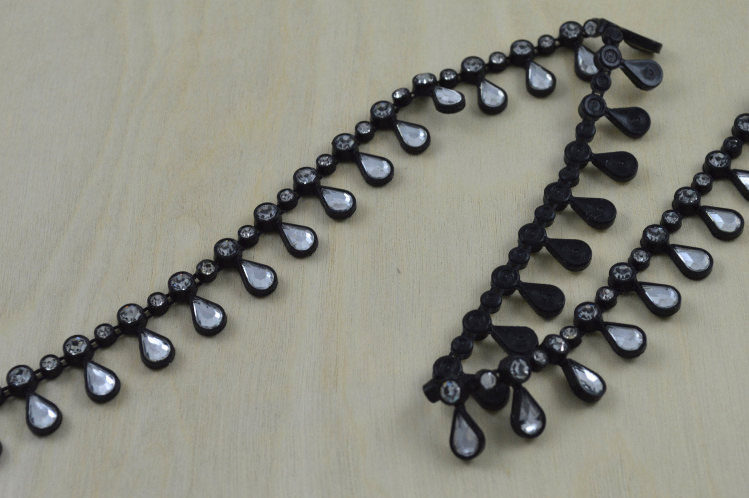 1 Yard Black Plastic Rhinestone Tear-Drop Complemented with Acrylic Stones